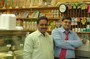 Sreenivas and Kishore looking towards the camera